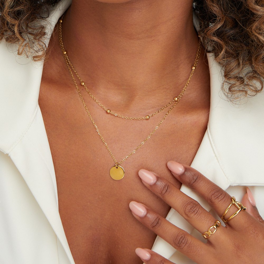 Gelaagde ketting met ronde bedel
